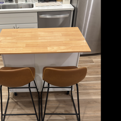 Rolling kitchen island for sale – $150 (two barstools included, optional).
