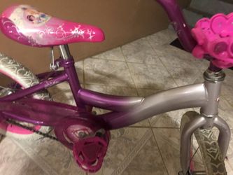 Girl pink Disney princess bicycle