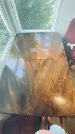 vintage wood dining table with an extension leaf, manufacturer by Drexel Heritage