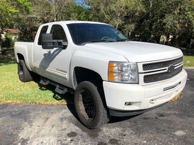 2012 CHEVY SILVERADO LTZ EXTENDED CAB LIFTED WHEELS AND NEW TIRES CLEAN TITLE