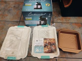 Brand new Continental stand mixer also 2 ..13 by 19 cookie trays and brownie pan all brand new ...35 doll for everything