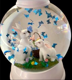 Charming Bath & Body Works Bunny Globe Candle Holder lights up and features floating butterflies within the water globe