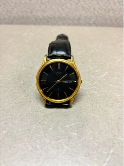 Vintage Citizen Spanish/English day date Quartz watch 34mm