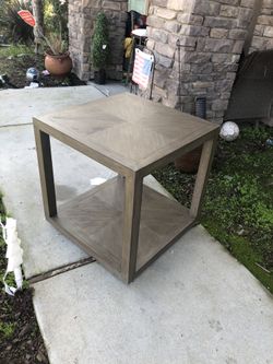Brand new solid wood large end table. Retails for over $600