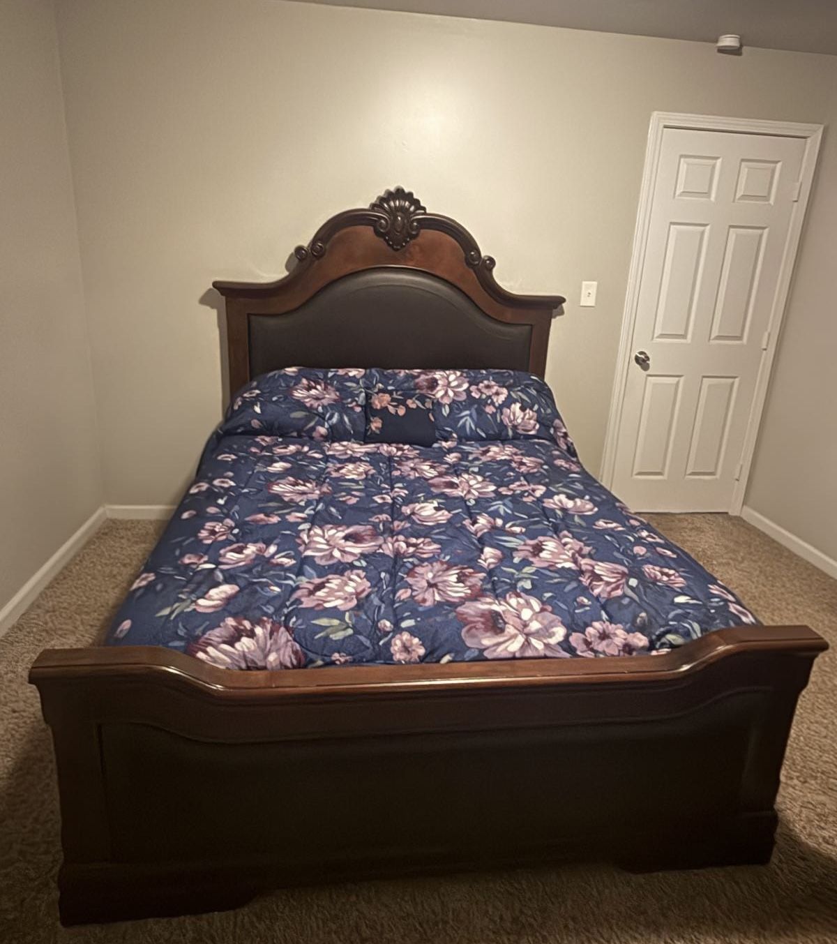 Queen sleigh bed with memory foam mattress and large dresser with mirror