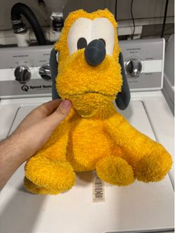 Pluto weighted plushie
