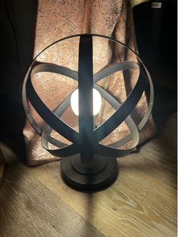 Spherical metal standing lamp