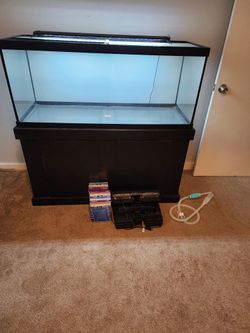 75-gallon aquarium with matching stand