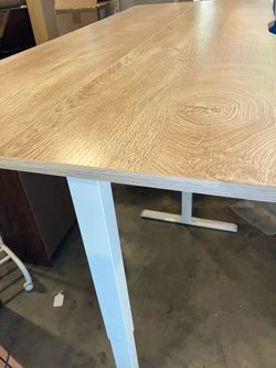 Adjustable Rising Desk