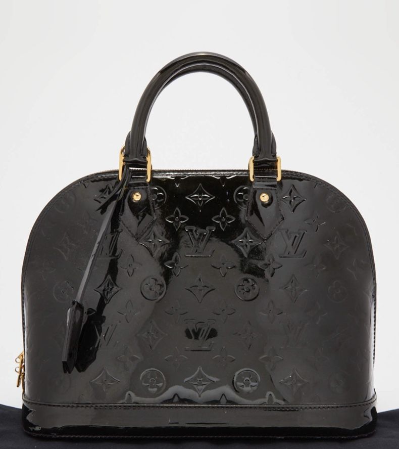 LOUIS VUITTON ALMA LEATHER HANDBAG