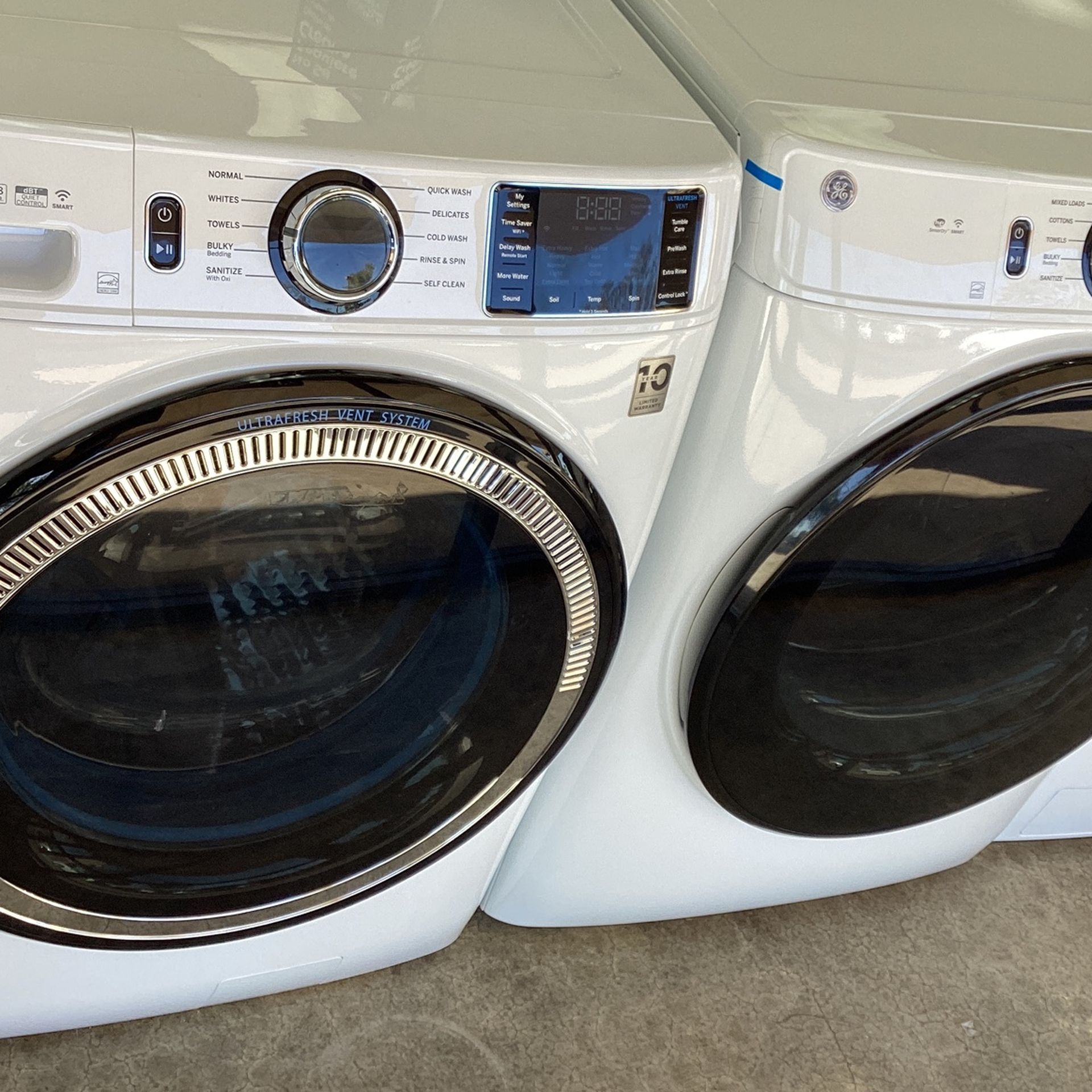 New GE Front Load Washer & Electric Dryer 