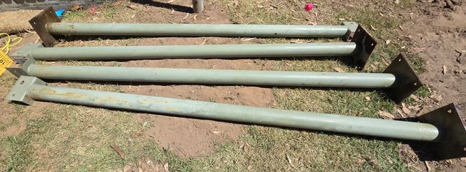 Used 1/4"   10' Steel Pipe Posts With Base Plates