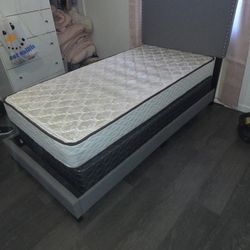 Almost New Twin Bed. Matress Box Spring AndFrame Included