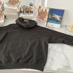 Essentials hoodie in charcoal gray. Features bold '1977' print