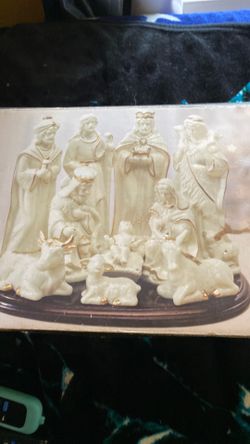 Porcelain nativity set with gold accents