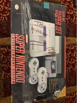 Super NES games and controller + box