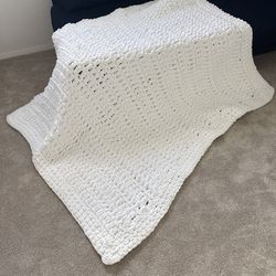 Handmade white crochet blanket