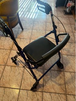 Walker with seat good condition