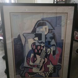 Artist: Pablo Picasso, a Spanish painter and sculptor. 
Art Movement: This painting is a notable example of Cubism, characterized by fragmented forms 