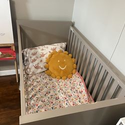 Matching crib and changing table