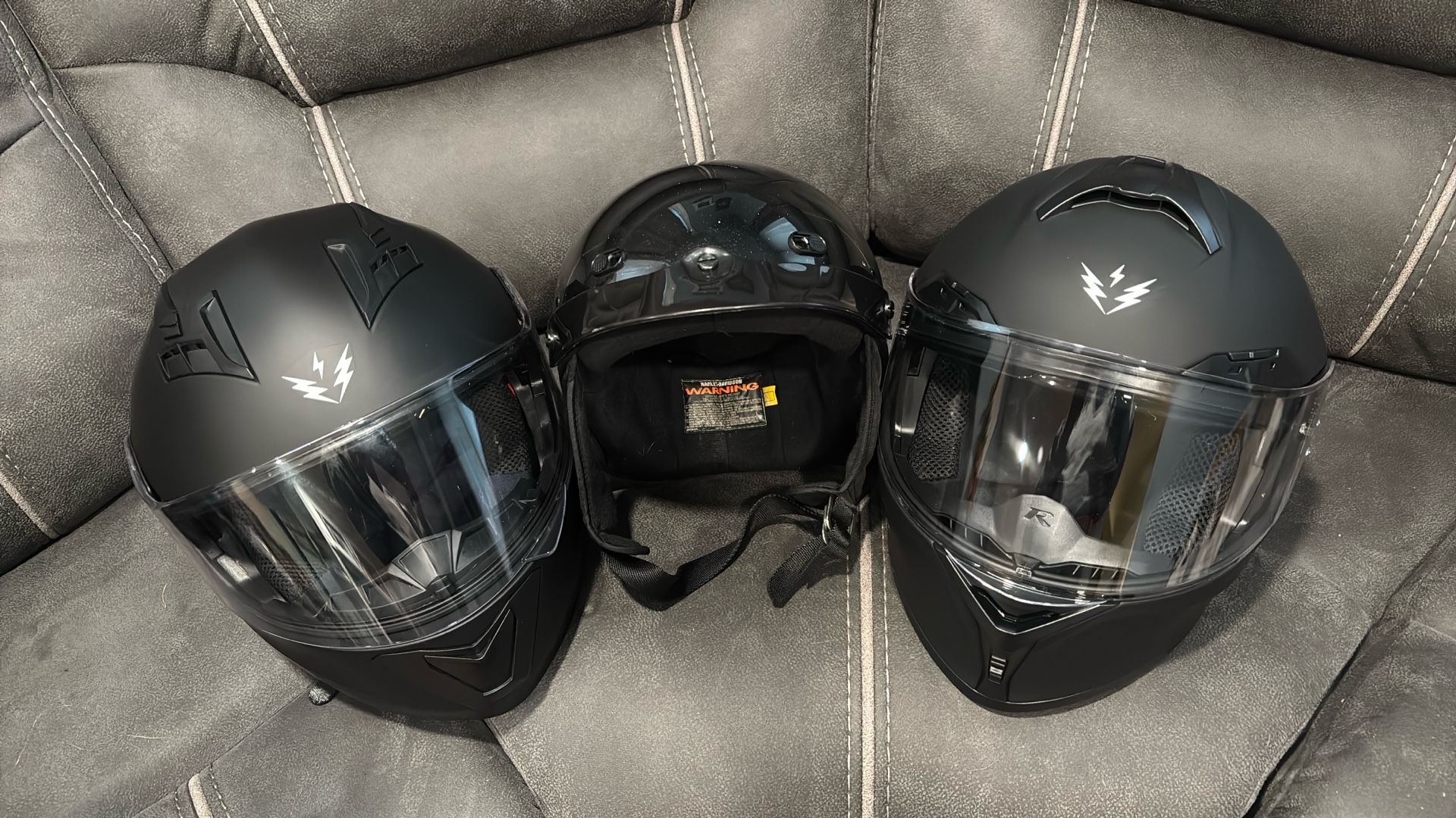 2 Black Motorcycle Helmets