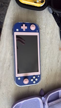 Nintendo switch lite (like New)