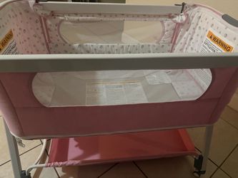 Pink Baby Bassinet with Storage Shelf