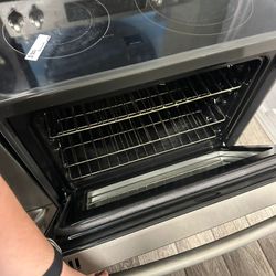 Whirlpool off white electric stove usedGe profile slate electric stove glass top used with warranty