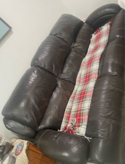 Electrical Leather Reclining couch.