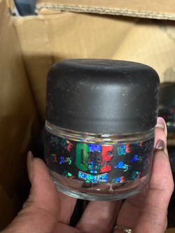 Empty exotic glass jars with lids.