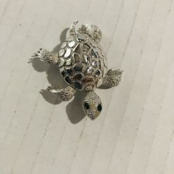 Monet Silver Tone Turtle Brooch with Emerald Green Eyes 
