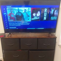Smart TV and dresser