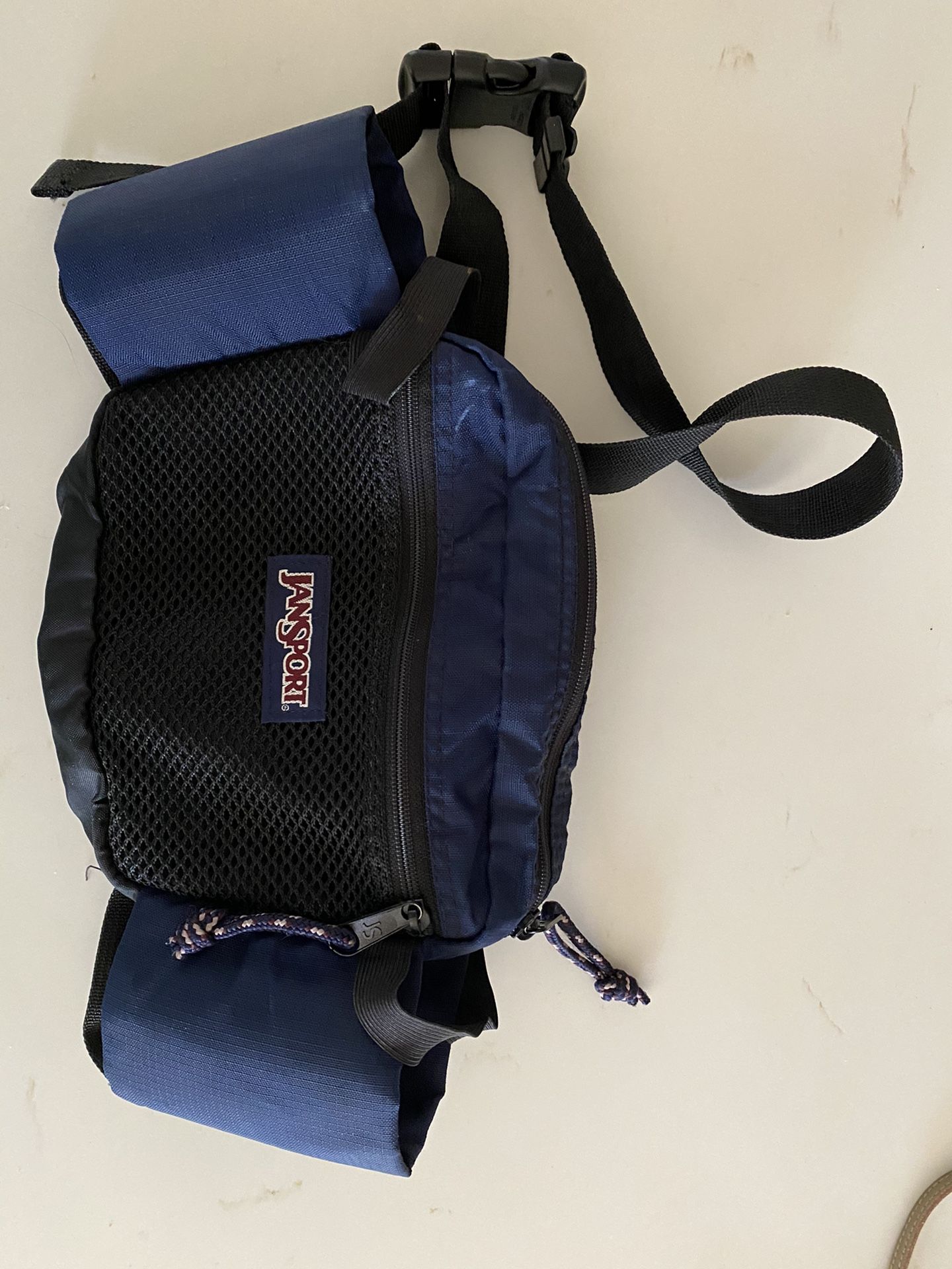 Jansport Fanny Pack. Holds 2 water bottles. Zippered compartments