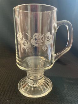 Four glass mugs