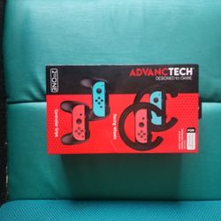 (Brand New SEALED) Nintendo Switch  2xSteering Wheels/2xController Grips