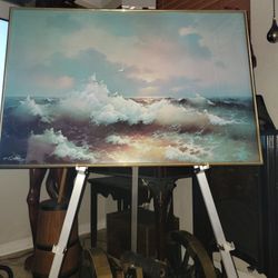 Beautiful framed ocean picture the $25 perfect perfect condition Glass and metal frame not plastic.   OBO