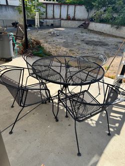Patio table and chairs iron