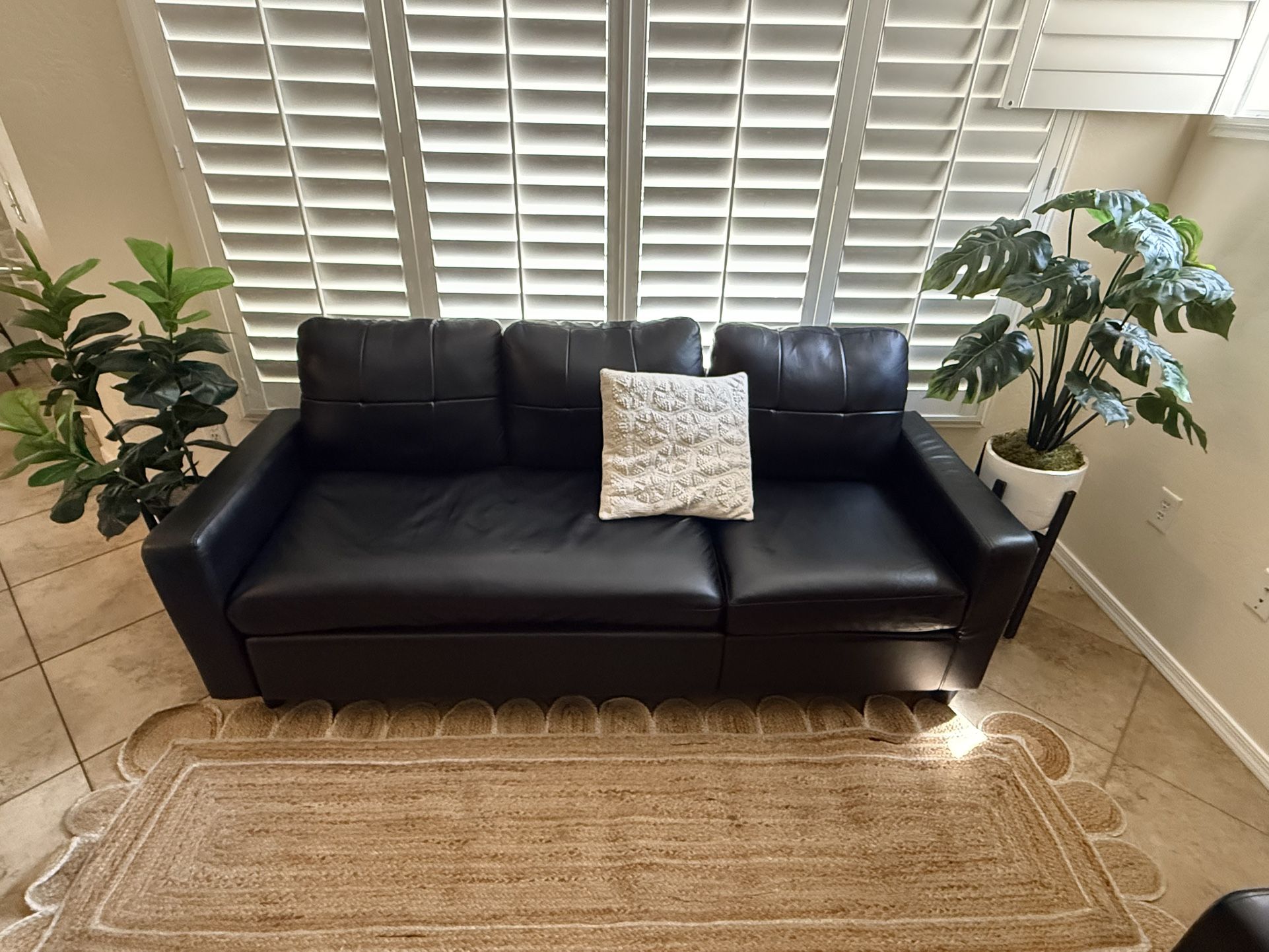 Living room couch w/ decor