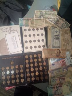 2 sets of coin collection and 1 silver dollar plus 20 different old bills