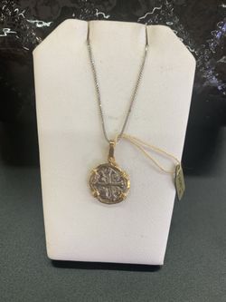Atocha silver coin pendant in gold bezel with silver chain