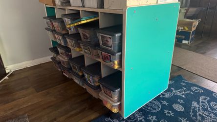 Dual sided cubby on wheels