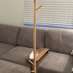 Bamboo Coat Rack – Natural Wood Modern freestanding coat rack made of natural bamboo wood. Strong, lightweight, and eco-friendly design. Multiple hook