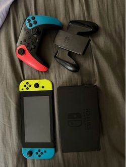 nintendo switch console with pro controller