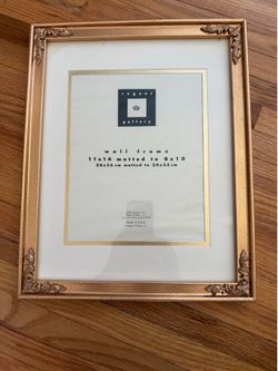 Gold toned wood 11 x 14 picture frame
