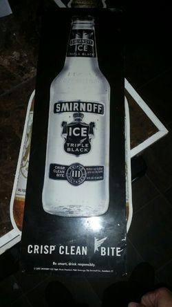 Smirnoff black tin sign
