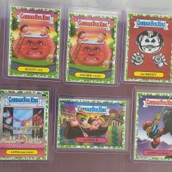 Lot of 10 Topps Garbage Pail Kids Booger Green Parallel cards.