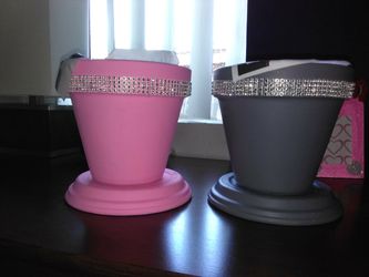 Baby shower decorations for grey ones and four pink ones flower pots