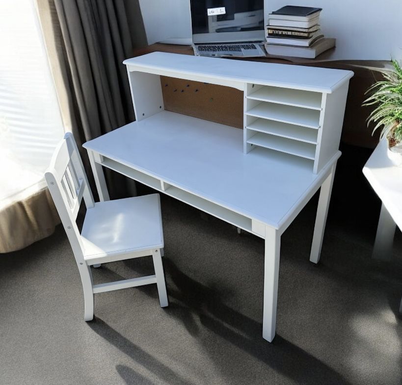 White teenager / student desk w/hutch $55, chair $10 . 24 deep x 43W 26H (40Hutch)