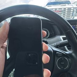 iPhone 11 (with case and charger)