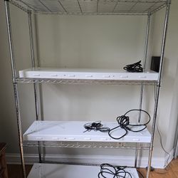 3 row adjustable plant stand with light fixtures and hoists